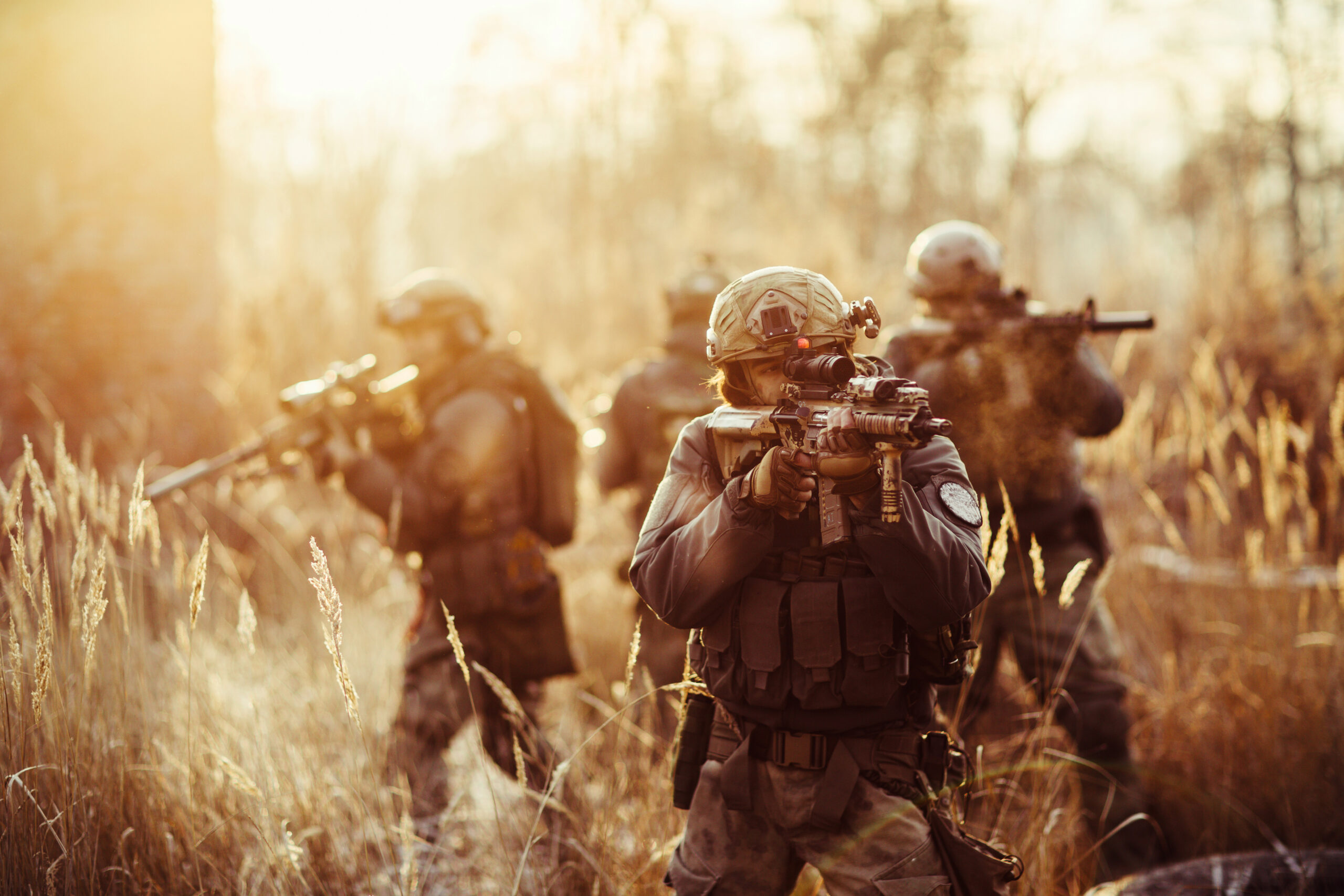 soldiers with guns on the field